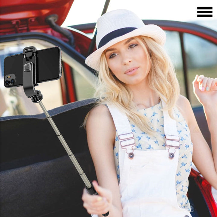 Justerbart Bluetooth selfie-stick och stativ, silver, kompakt design, inbyggd fjärrkontroll, för fotografering och resor.