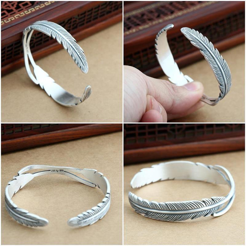 "Justerbart silverfjäderarmband för kvinnor, nickelfritt och elegant design med symboliskt fjädermotiv."