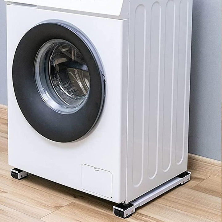 "Justerbart skjuthjul i grå plast och metall, perfekta för att flytta tunga hushållsapparater enkelt och skydda golv."