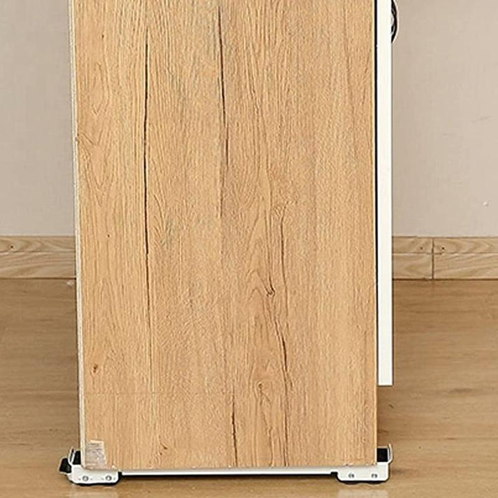 "Justerbart skjuthjul i grå plast och metall, perfekta för att flytta tunga hushållsapparater enkelt och skydda golv."