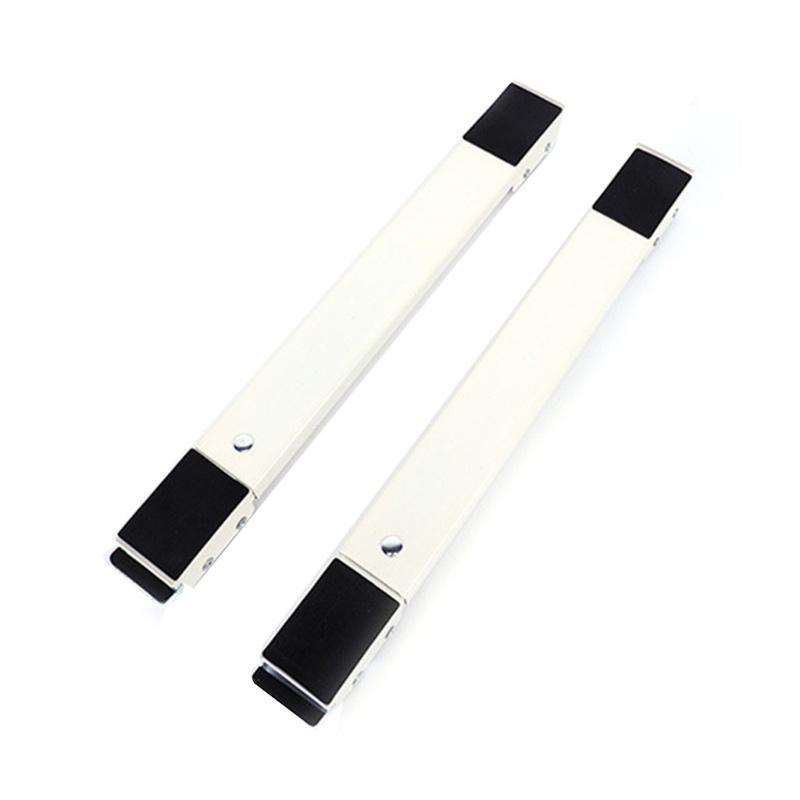 "Justerbart skjuthjul i grå plast och metall, perfekta för att flytta tunga hushållsapparater enkelt och skydda golv."