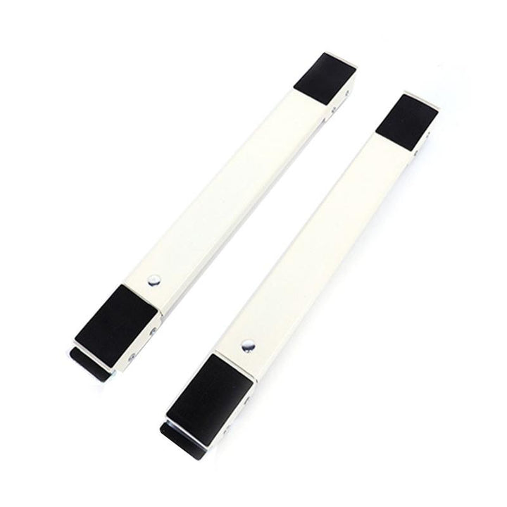 "Justerbart skjuthjul i grå plast och metall, perfekta för att flytta tunga hushållsapparater enkelt och skydda golv."