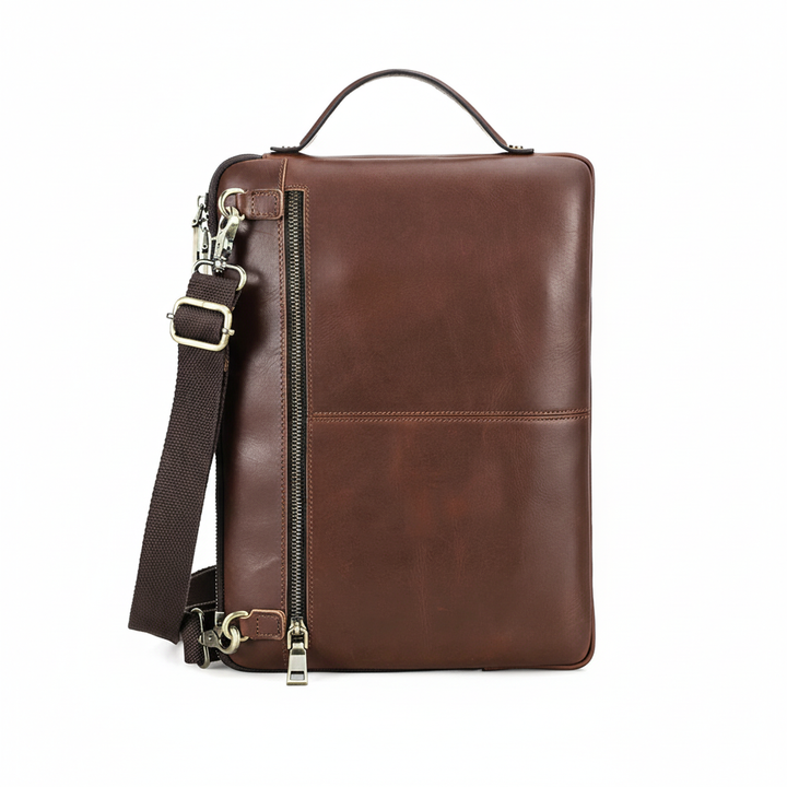 Organiserad kaffebrun läder laptopväska, perfekt för affärsresor. Stilren unisex axelremsväska för proffs.