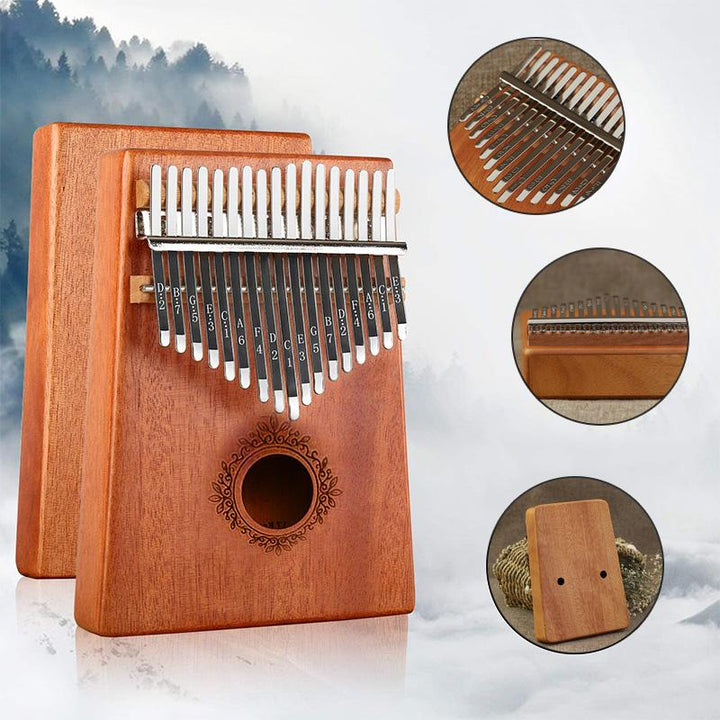 "Kalimba i mahogny med 17 metalltangenter, visad i närbild, ger melodiskt och varmt ljud, perfekt för portabelt spel."