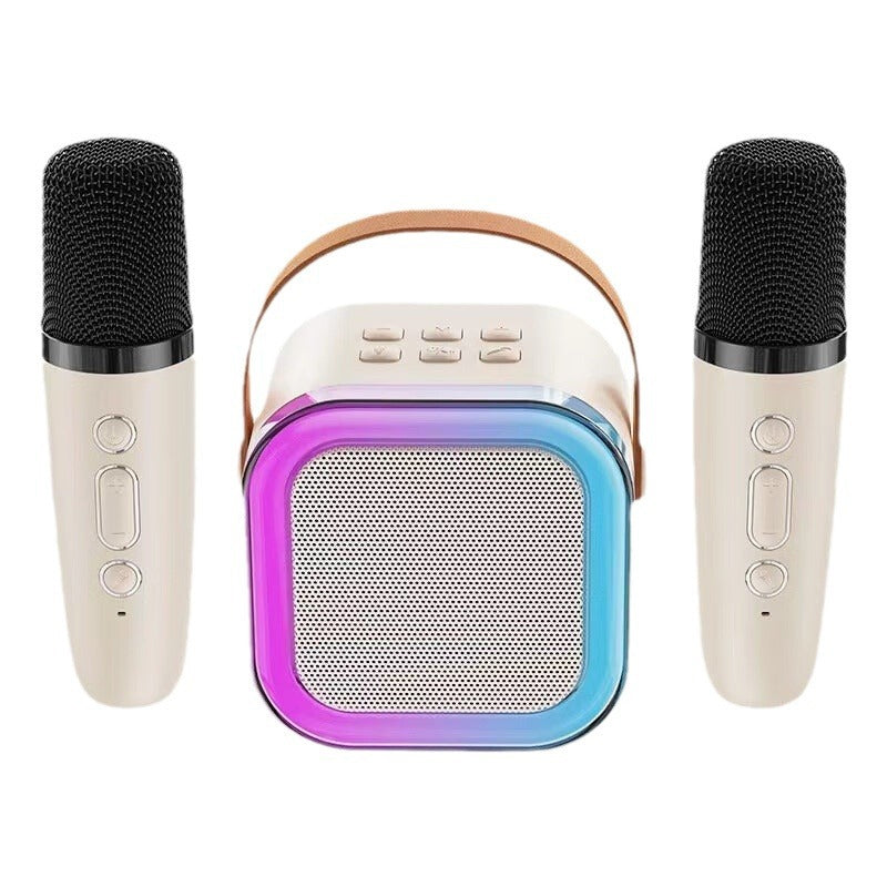 "Karaokemaskin för barn med två trådlösa mikrofoner, färgglada och bärbara, perfekt för sång och lek."