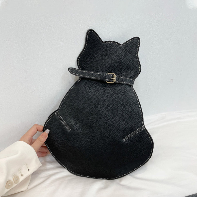 "Kattformad korsväska i svart PU-läder för kvinnor, unikt kattdesign, stilren och rymlig accessoar."