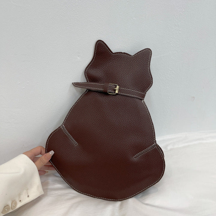 "Kattformad korsväska i svart PU-läder för kvinnor, unikt kattdesign, stilren och rymlig accessoar."