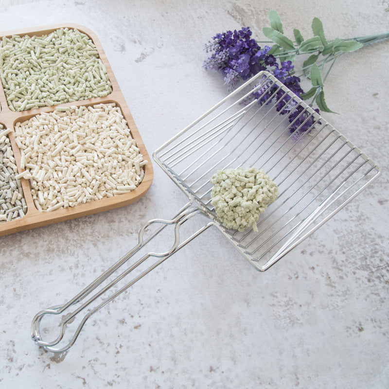 "Kattvänlig premium kattkullssopa med ergonomiskt handtag, elegant design, effektiv för att hantera kattlåda."