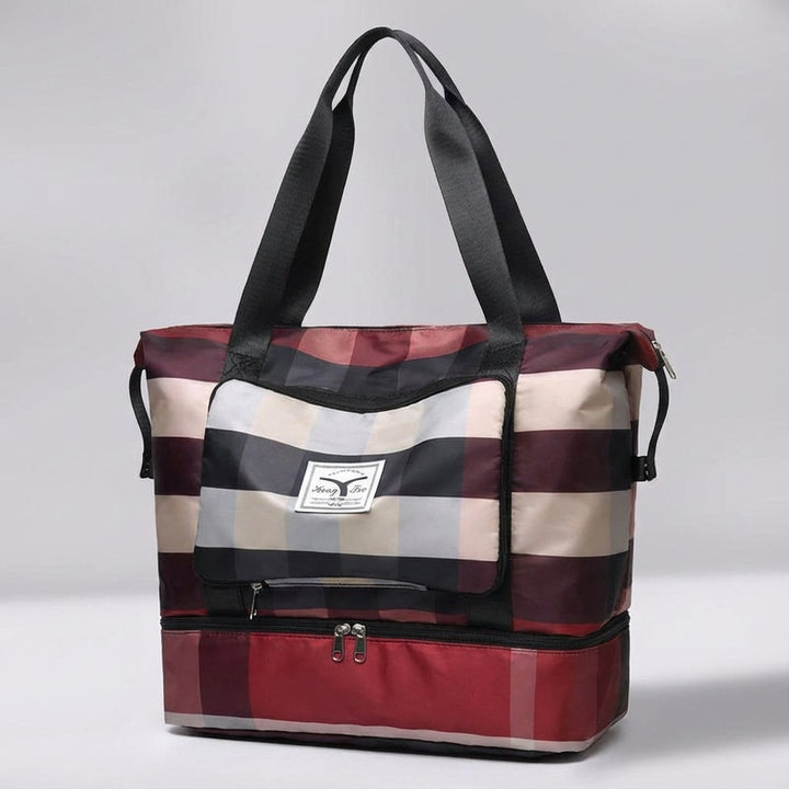 Smart kabinväska med bottenfack. Organiserad weekendväska för smidig resa. Unisex och robust design.