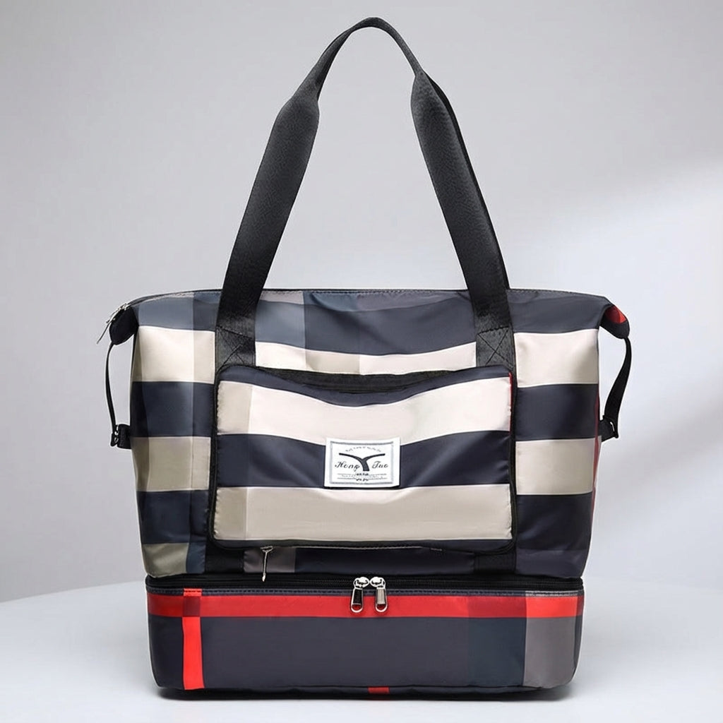 Mångsidig weekendväska för unisex med bottenfack. Fungerar som resväska, sportväska & kabinväska. Vattenavvisande.
