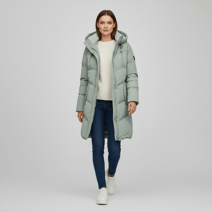 Dam vinterparka i khaki, med huva och dragkedja. Idealisk för damkläder vinter.