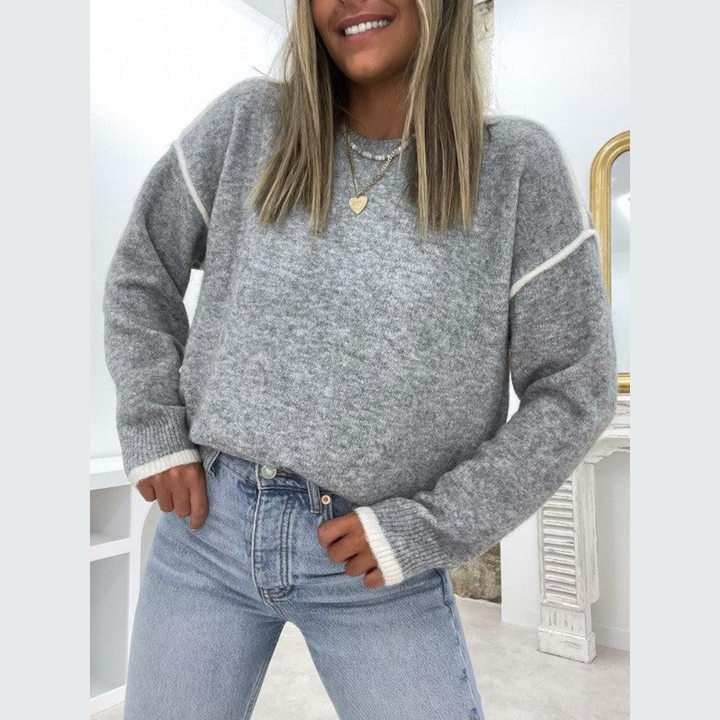 Klassisk damtröja med rund hals, perfekt för hösten. Mjuk, bekväm pullover för stilren vardagsstil.