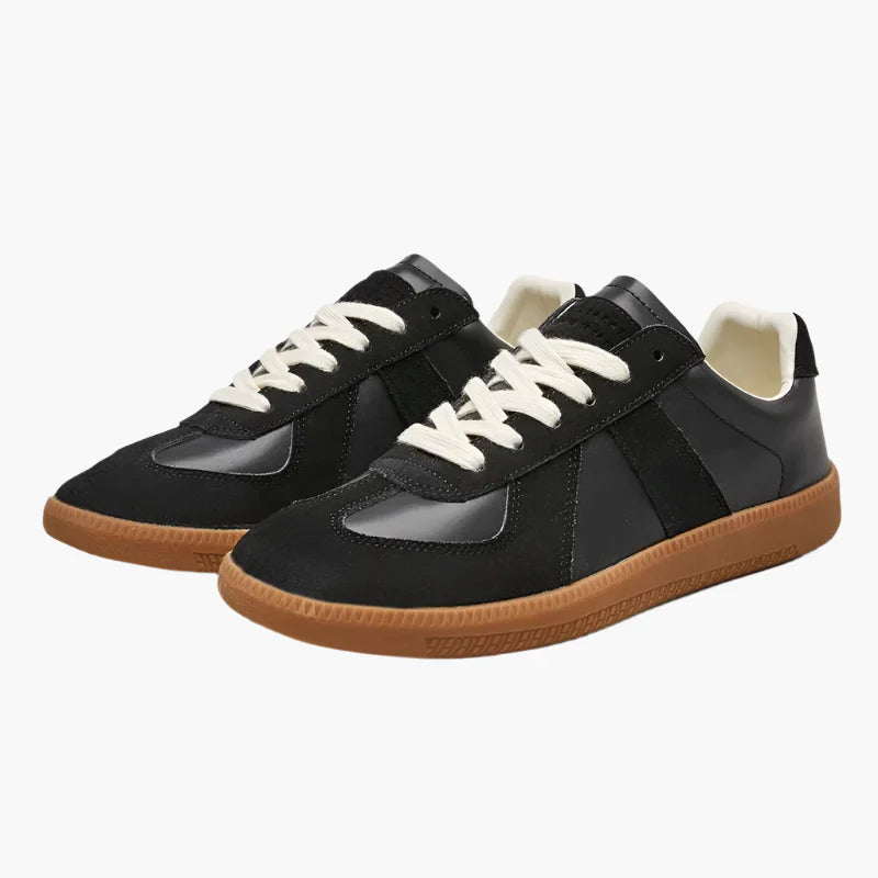Herrsneaker i klassisk retrodesign, idealisk för stadens puls. Bekväma och stilfulla för alla sommarens äventyr.