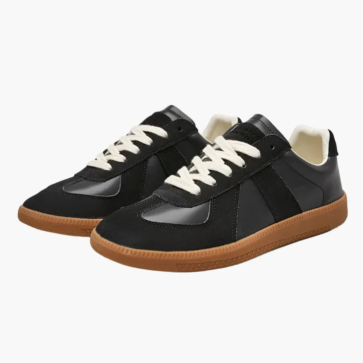 Herrsneaker i klassisk retrodesign, idealisk för stadens puls. Bekväma och stilfulla för alla sommarens äventyr.
