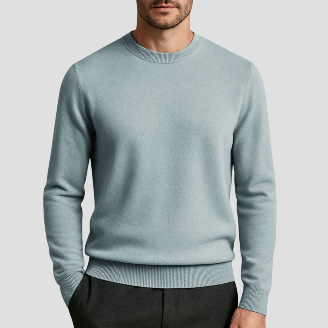 Herrtröja Marcus, klassisk rundhalsad design i stickad kvalitet för tidlös stil. Perfekt för män.
