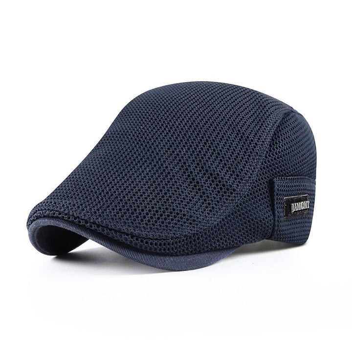 Elegant justerbar herrkeps i strukturerat tyg. En tidlös accessoar för modern vardagslook.