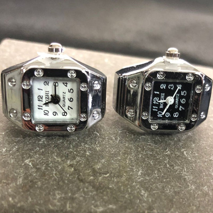 "Klockring med unisex design i olika färger, visar elegant rem och klart urtavlans display, perfekt för par."