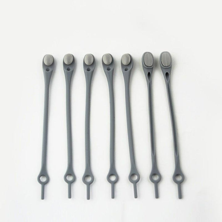 "Knytfria silikon skosnören i färgglada nyanser, elastiska och vattentäta, för unisex skor med öljetter."