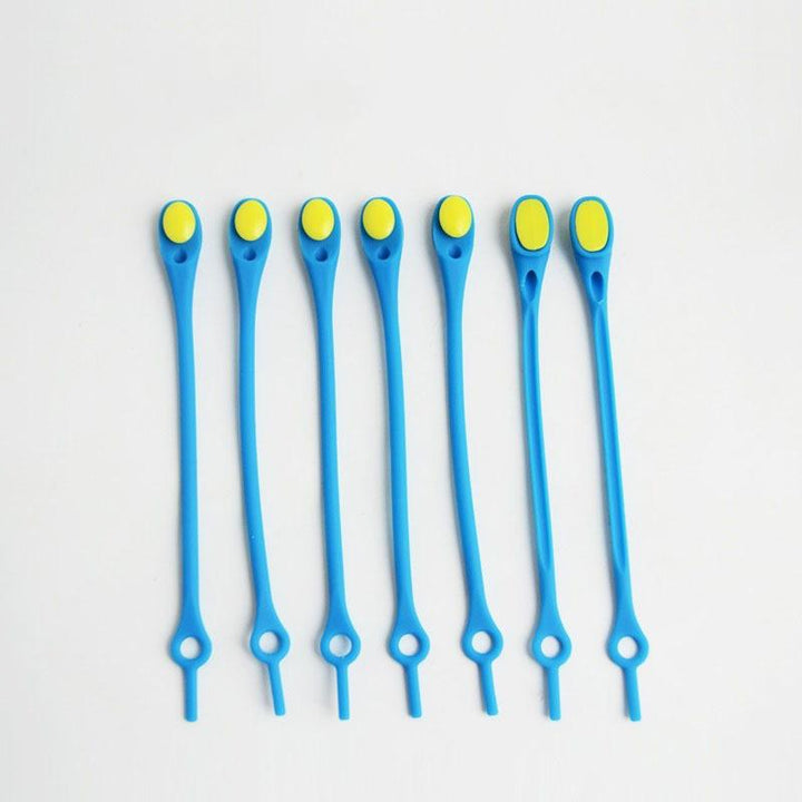 "Knytfria silikon skosnören i färgglada nyanser, elastiska och vattentäta, för unisex skor med öljetter."