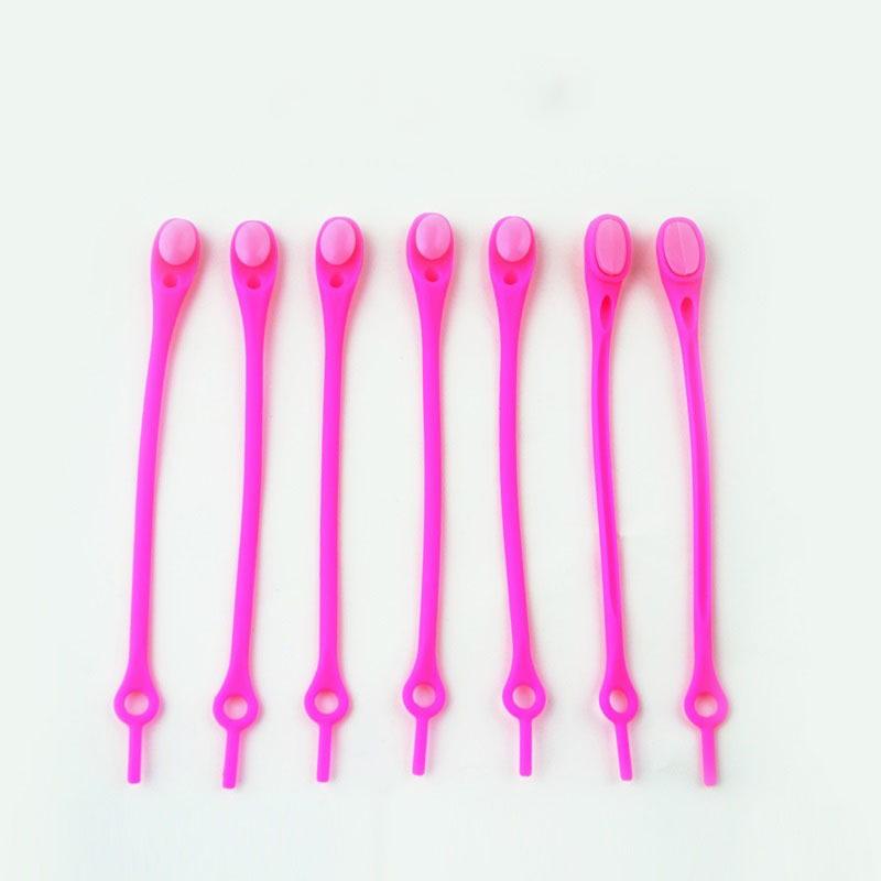 "Knytfria silikon skosnören i färgglada nyanser, elastiska och vattentäta, för unisex skor med öljetter."