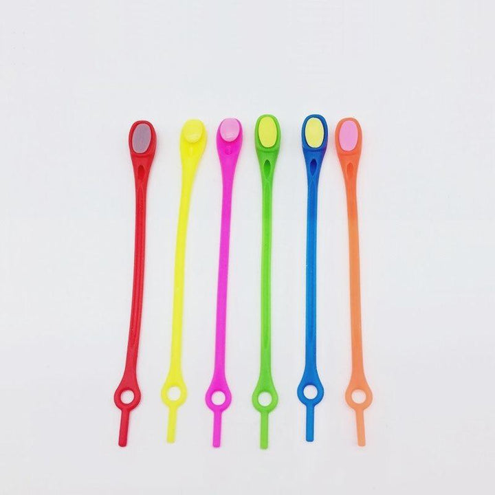 "Knytfria silikon skosnören i färgglada nyanser, elastiska och vattentäta, för unisex skor med öljetter."