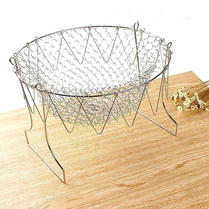"Kockkorg i rostfritt stål med stilren design, perfekt för kokning, fritering och ånga i köket, 12x16x23 cm."