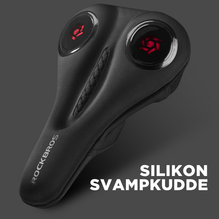 "Komfortabelt cykelsadelöverdrag av gel och memory foam för stötdämpning, svart med blått, perfekt för cykelturer."