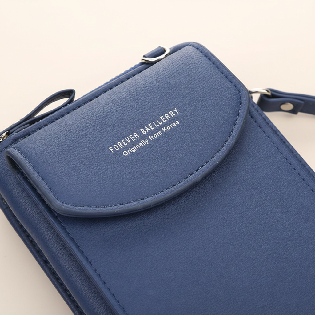 Organiserad crossbody damplånbok i konstläder. Flera fack för kort, mynt och telefon, praktisk och modern.