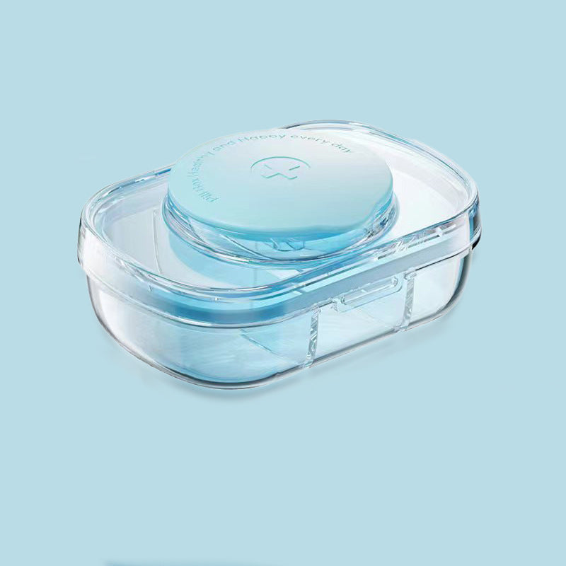 Kompakt medicingurkkärna med 3 fack i grön, blå och vit, ergonomisk design för enkel förvaring av piller.