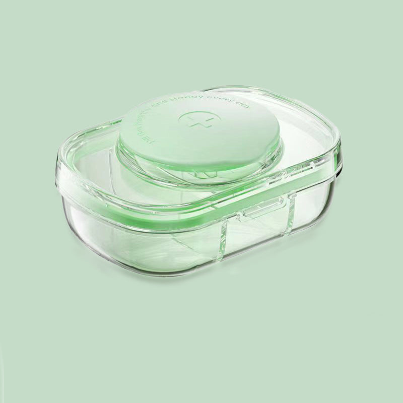 Kompakt medicingurkkärna med 3 fack i grön, blå och vit, ergonomisk design för enkel förvaring av piller.