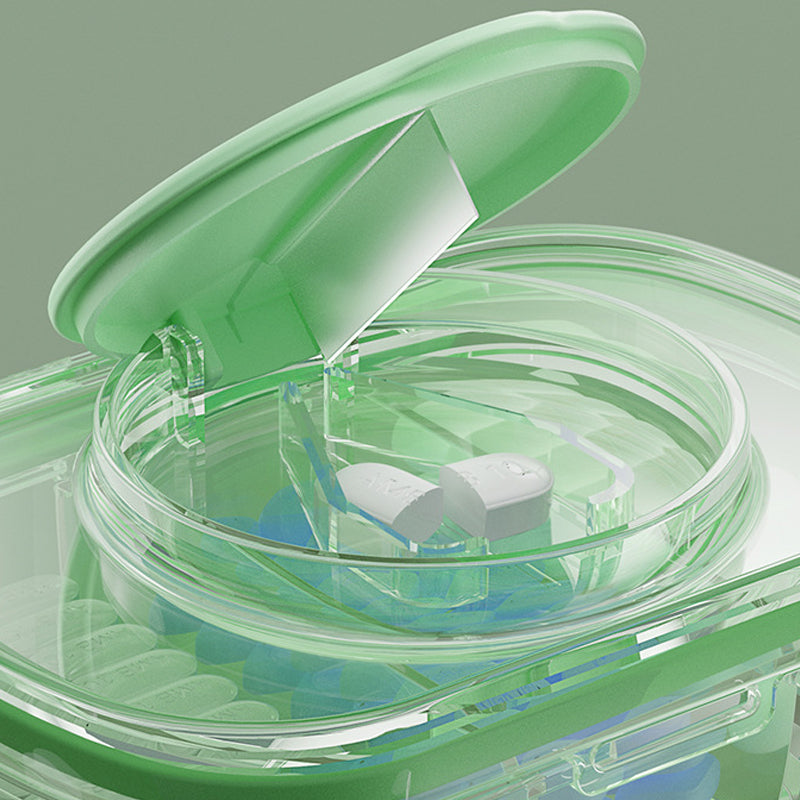 Kompakt medicingurkkärna med 3 fack i grön, blå och vit, ergonomisk design för enkel förvaring av piller.