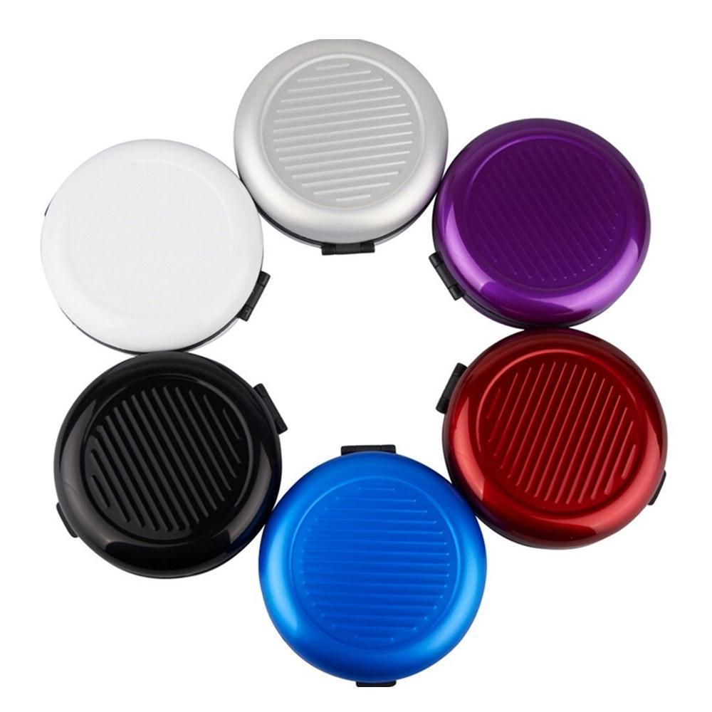 "Kompakt myntdispenser i aluminium, rund form, hållbar och lätt, för smidig myntorganisation, elegant och mångfärgad."