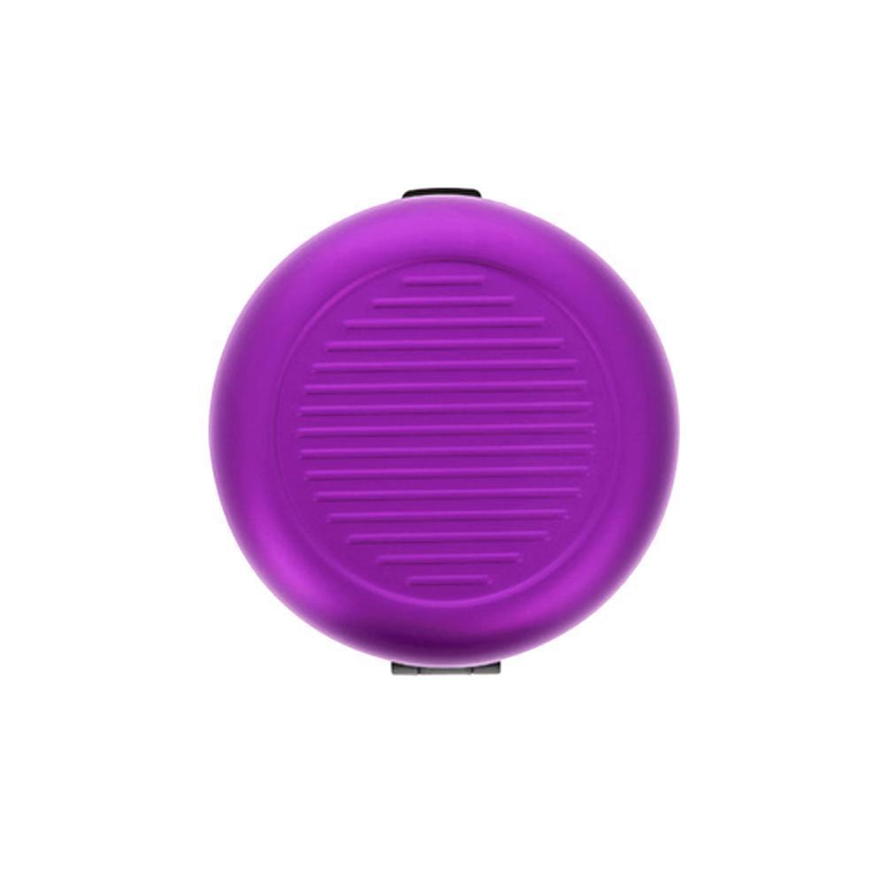 "Kompakt myntdispenser i aluminium, rund form, hållbar och lätt, för smidig myntorganisation, elegant och mångfärgad."