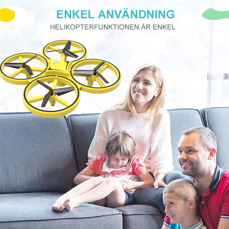 "Kompakt RC Nano Quadcopter med gravitationssensor, färgglada LED-ljus och lättanvända kontroller för barn."