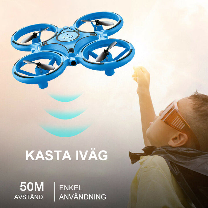 "Kompakt RC Nano Quadcopter med gravitationssensor, färgglada LED-ljus och lättanvända kontroller för barn."