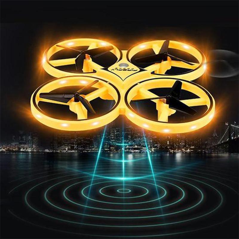 "Kompakt RC Nano Quadcopter med gravitationssensor, färgglada LED-ljus och lättanvända kontroller för barn."