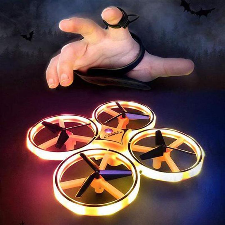 "Kompakt RC Nano Quadcopter med gravitationssensor, färgglada LED-ljus och lättanvända kontroller för barn."