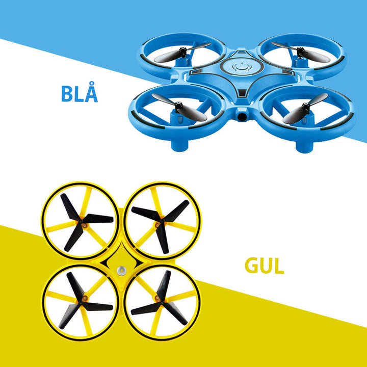 "Kompakt RC Nano Quadcopter med gravitationssensor, färgglada LED-ljus och lättanvända kontroller för barn."
