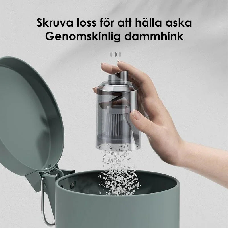 "Kompakt trådlös handhållen bildammsugare i svart för hem och bil, med kraftfull sugkapacitet och enkel hantering."