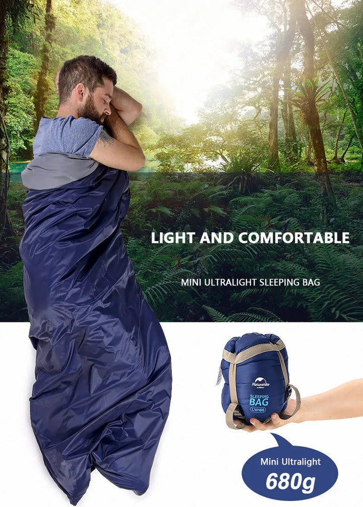 Ultralätt sovsäck vid tält, redo för camping och vandring. Ger värme och kompakt bärbarhet i naturen.