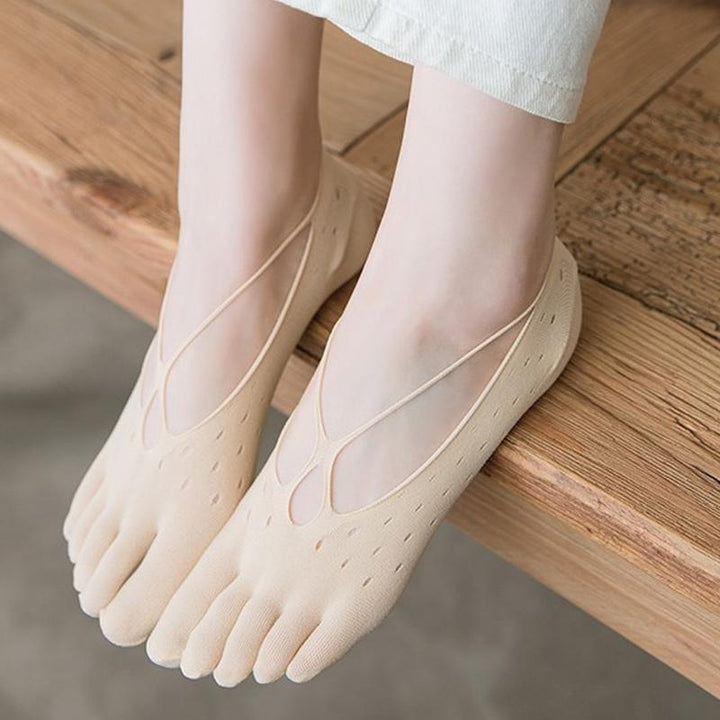 "Korta damtåstrumpor i bomull, svart och flerfärgade, elegant design för komfort och stil, perfekta för vardagsbruk."