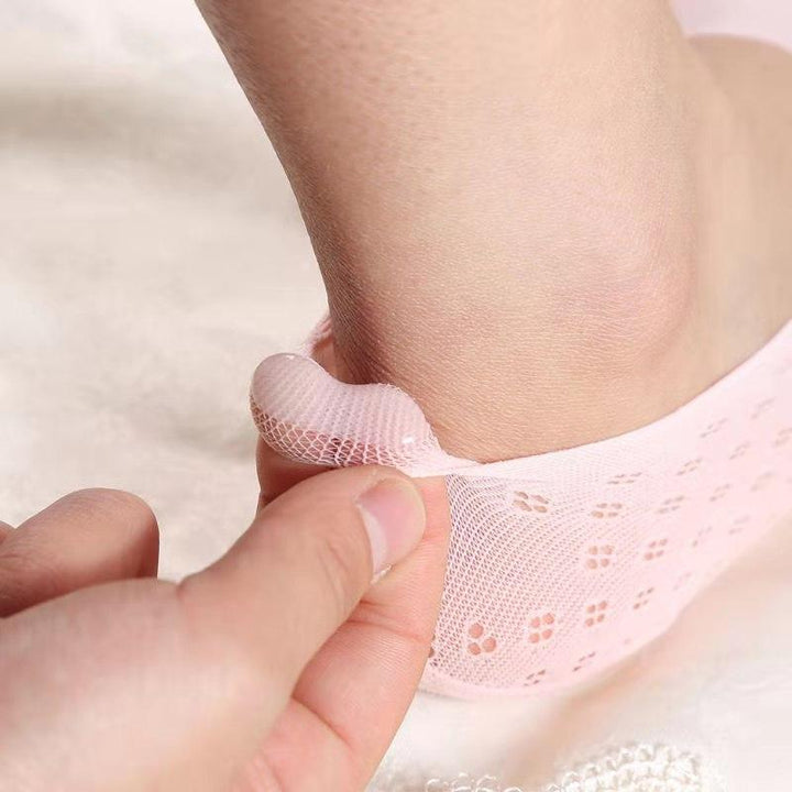 "Korta damtåstrumpor i bomull, svart och flerfärgade, elegant design för komfort och stil, perfekta för vardagsbruk."