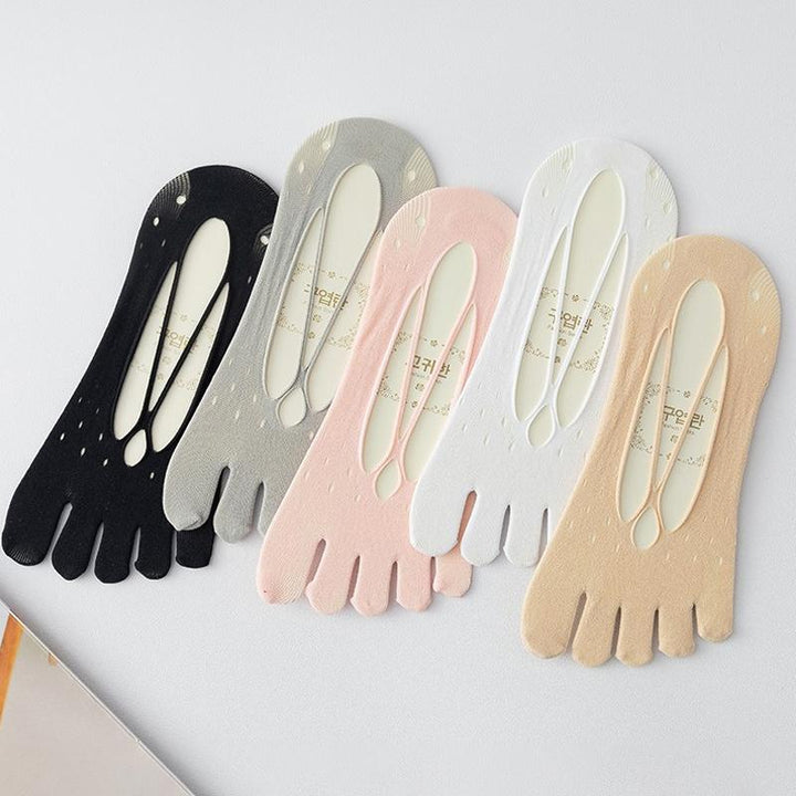 "Korta damtåstrumpor i bomull, svart och flerfärgade, elegant design för komfort och stil, perfekta för vardagsbruk."