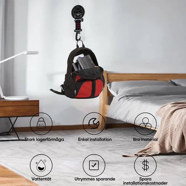 "Kraftig svart vakuumsugkopp med krok för utomhusbruk, perfekt för hänga handdukar, verktyg; kapacitet 10 kg."