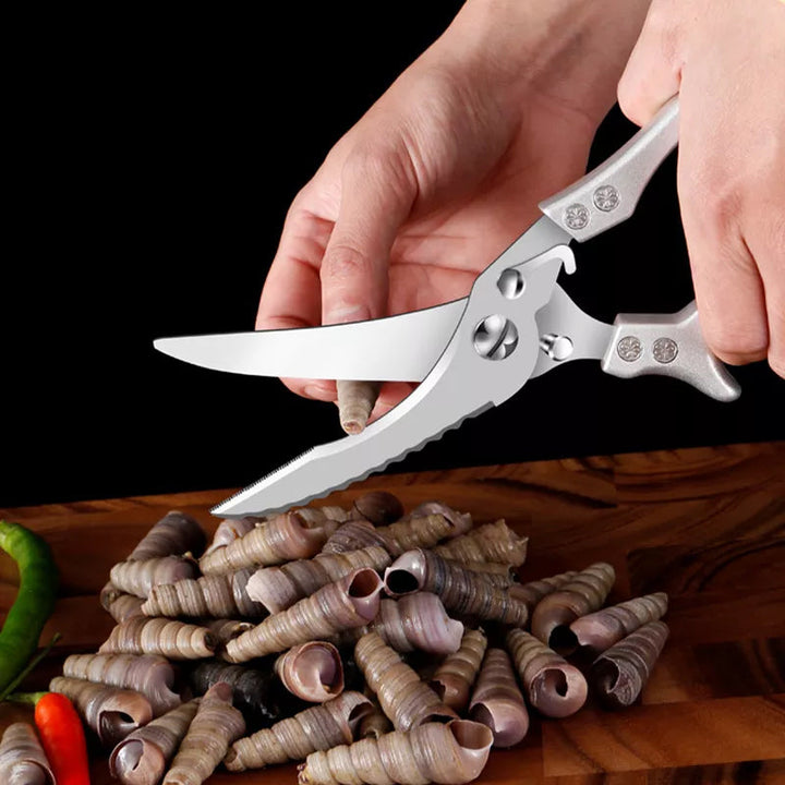 "Kraftiga kökssaxar i rostfritt stål, ergonomisk design, skarp blad för kycklingben och kött."