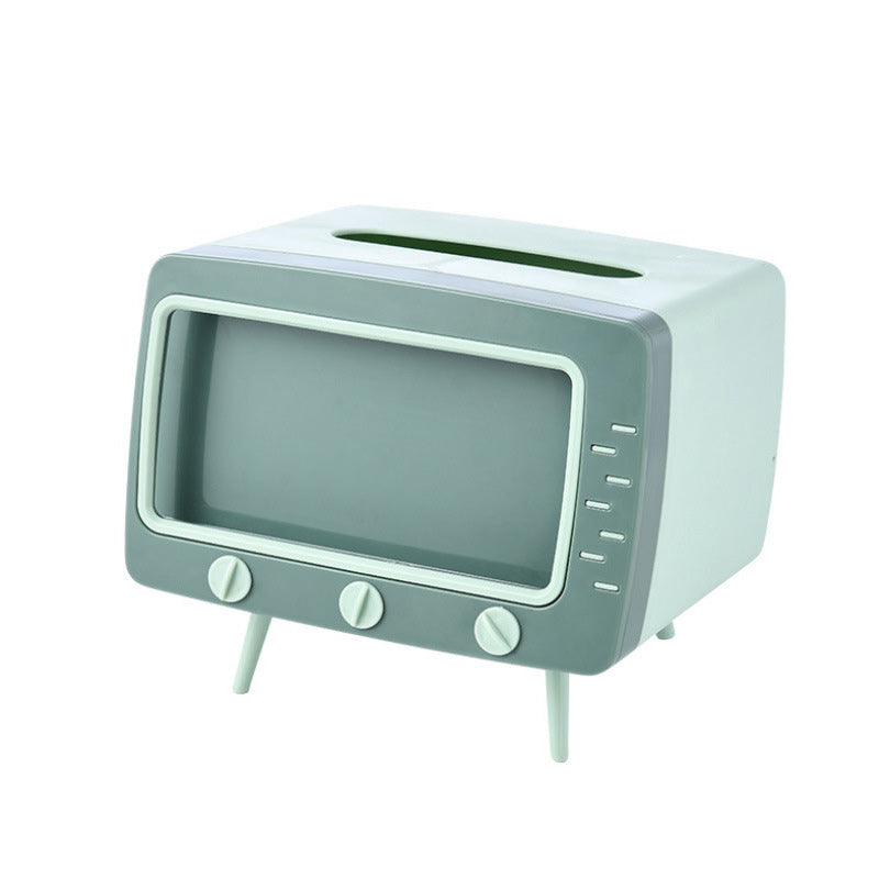 "Kreativ retro TV-servettlåda med mobilhållare i pastellfärger, nostalgi design för smart och stilren inredning."