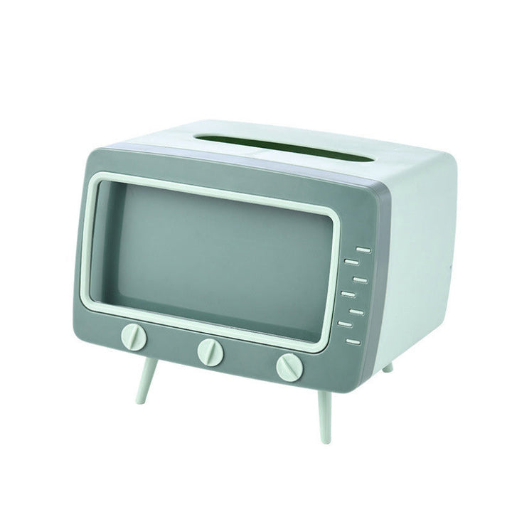 "Kreativ retro TV-servettlåda med mobilhållare i pastellfärger, nostalgi design för smart och stilren inredning."