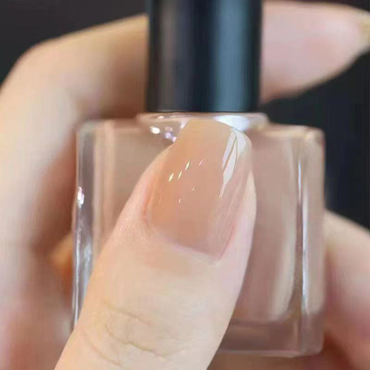 Kristallklart Ice Clear nagellack, glänsande finish, genomskinlig flaska, ger naturligt lysande naglar och skyddande barriär.