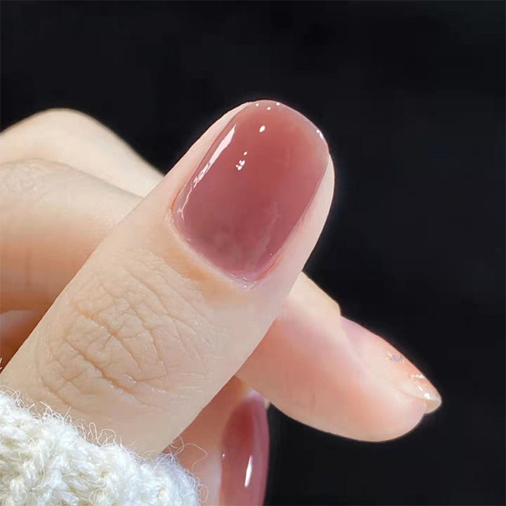 Kristallklart Ice Clear nagellack, glänsande finish, genomskinlig flaska, ger naturligt lysande naglar och skyddande barriär.