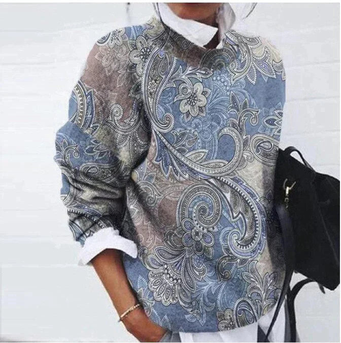Kvinnlig modell visar stilren damtröja med leopardmönster, bekväm för vardags- och festkläder.